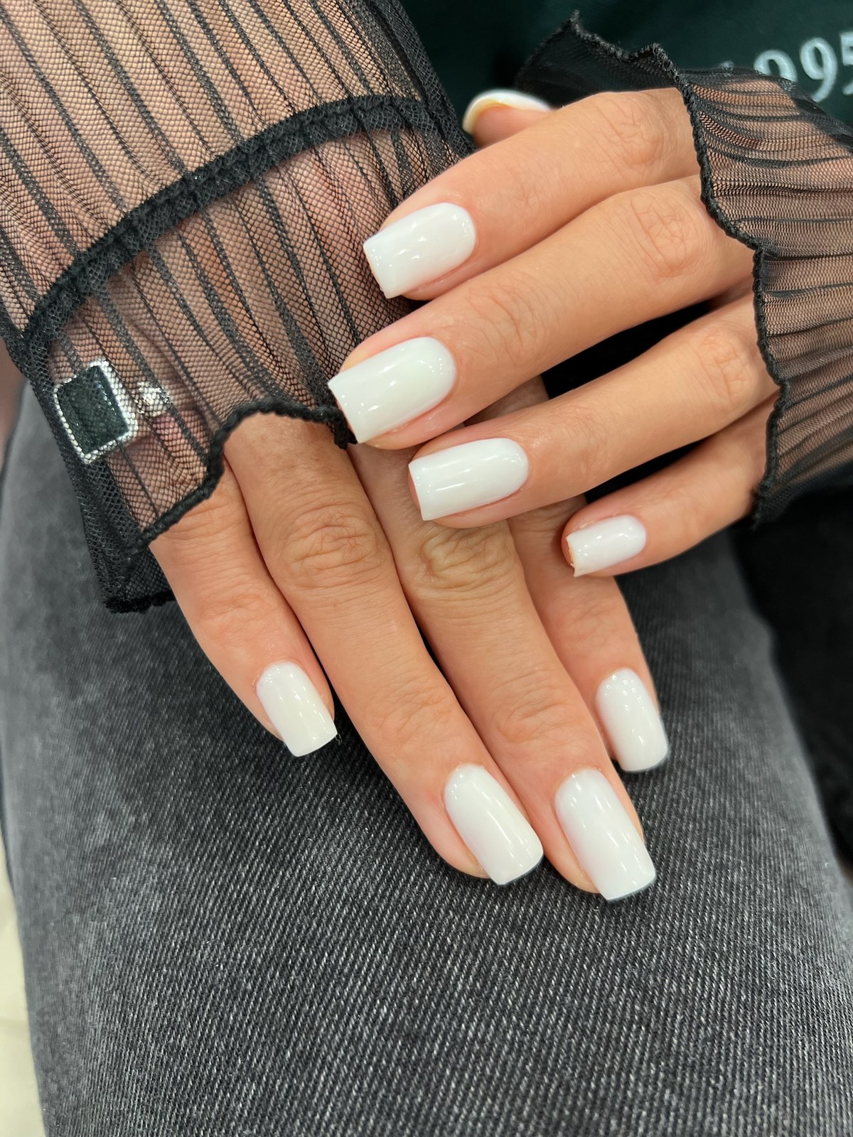 Glossy white square manicure