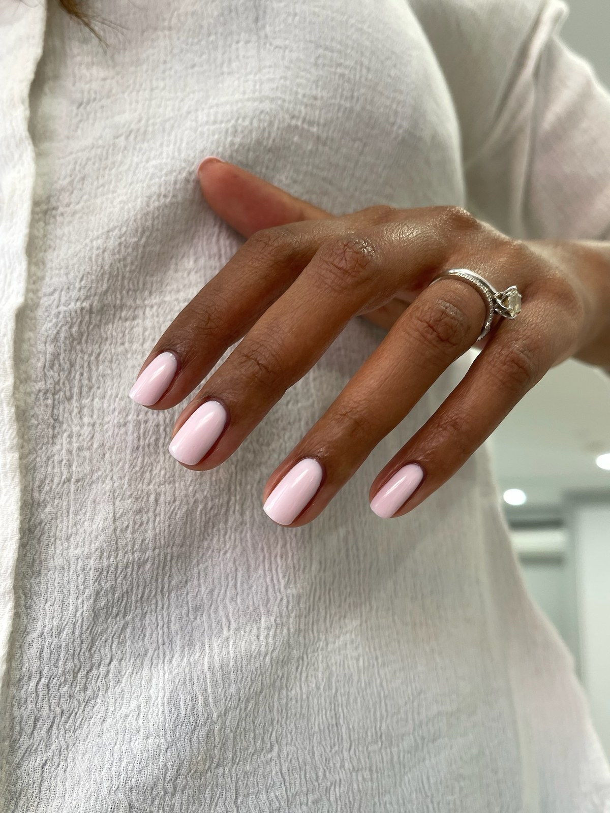 Pale pink glossy manicure
