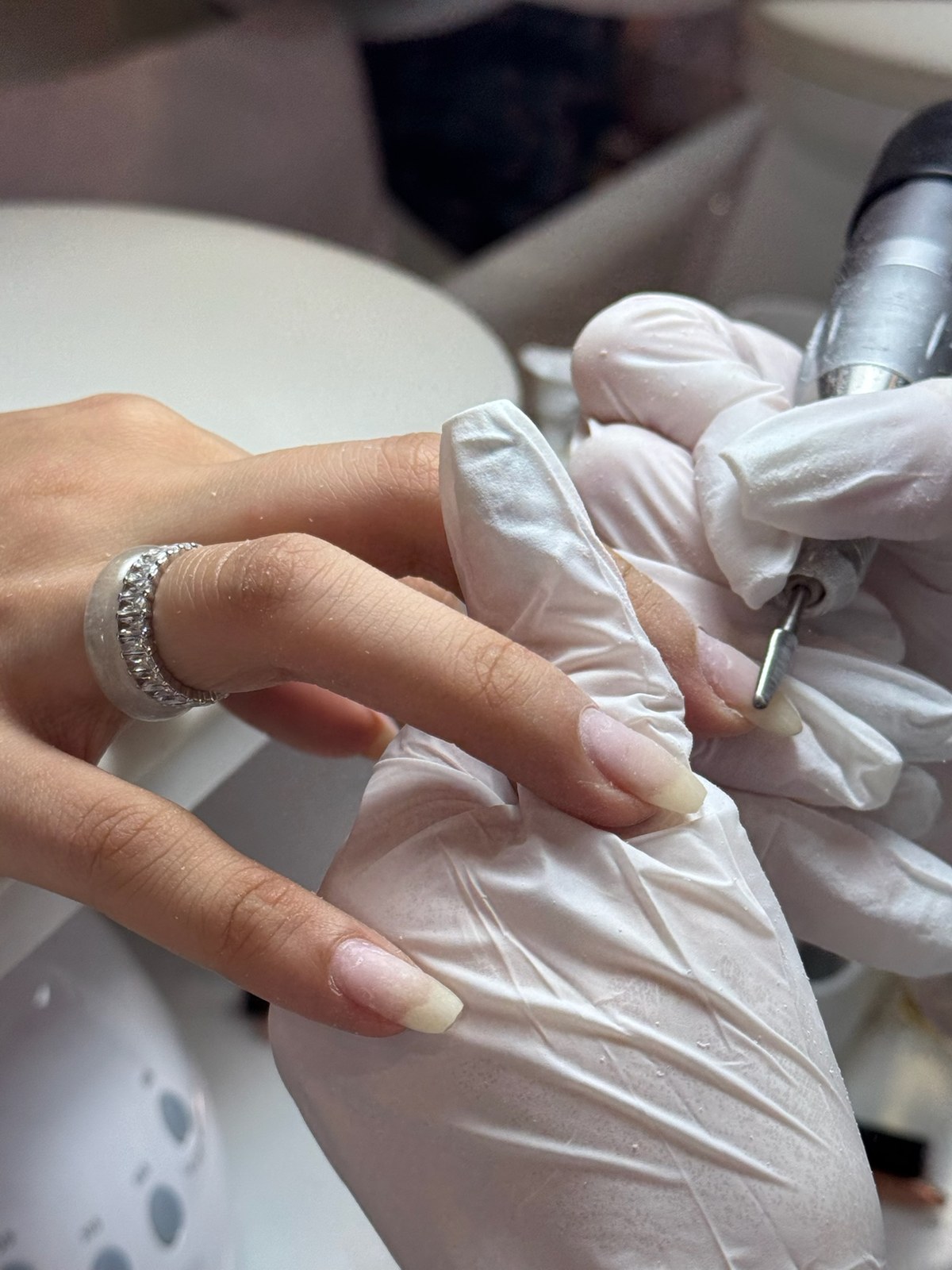 Gel manicure application in progress