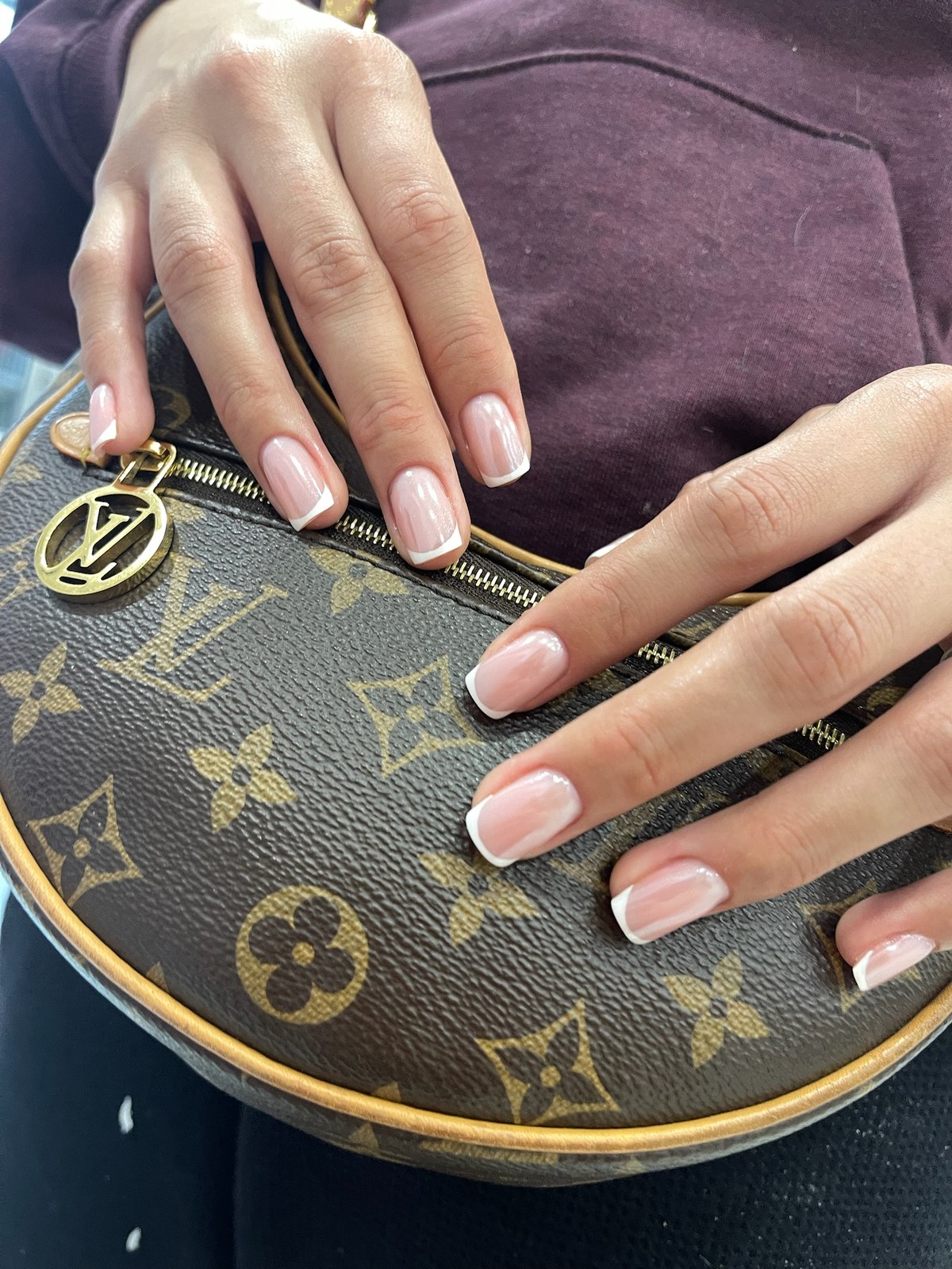 Nude pink glossy manicure