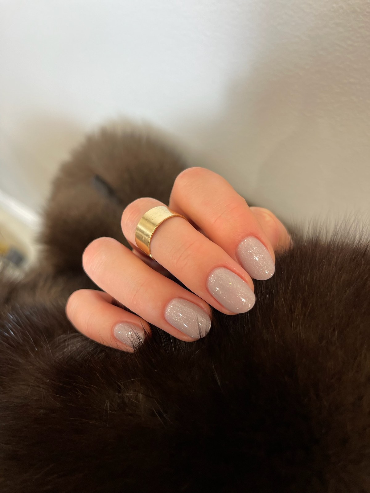 Taupe nude glossy manicure