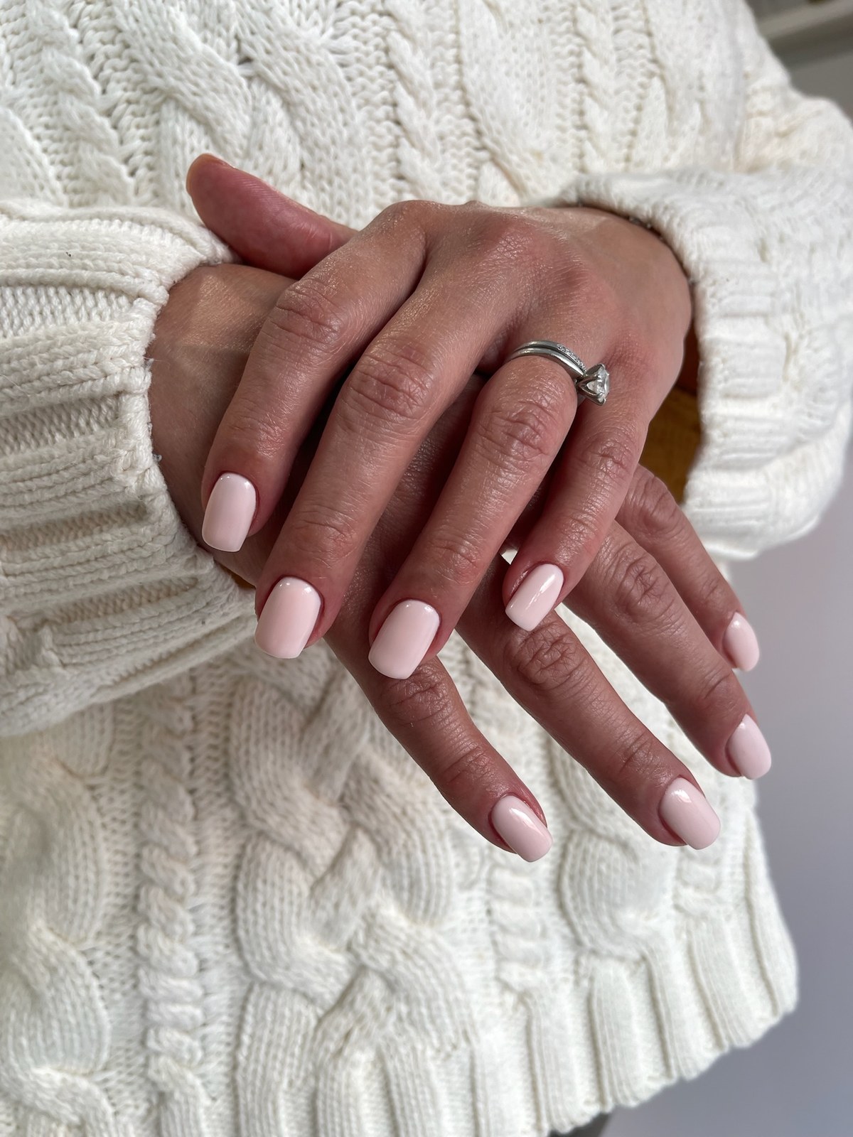 Pale pink glossy manicure