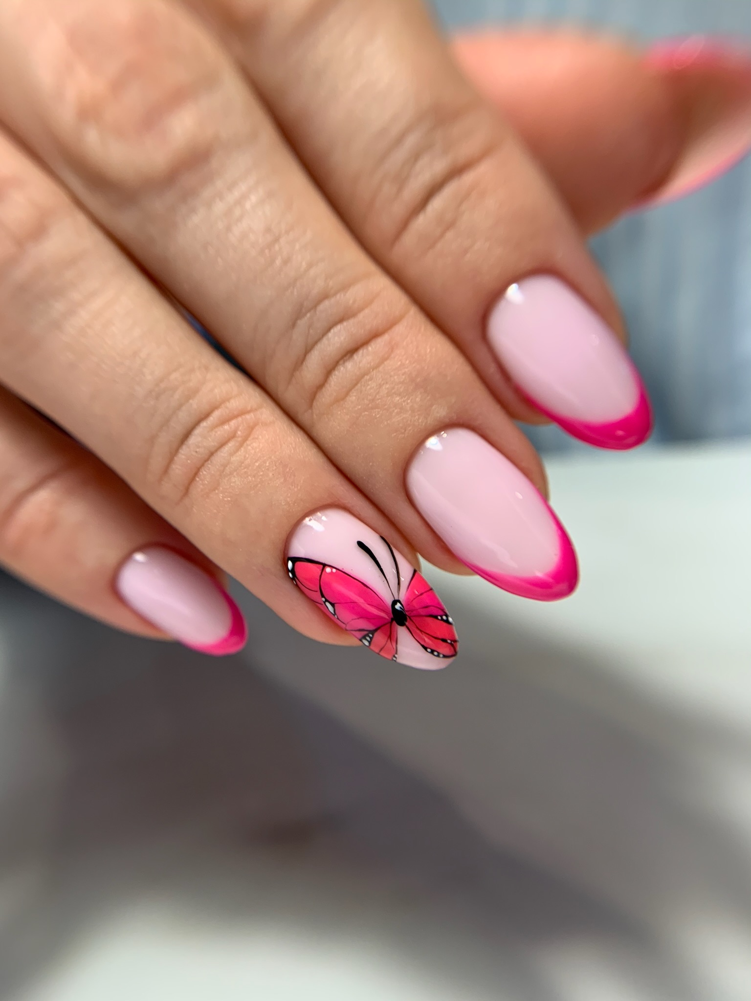 Hand-painted butterfly nail art