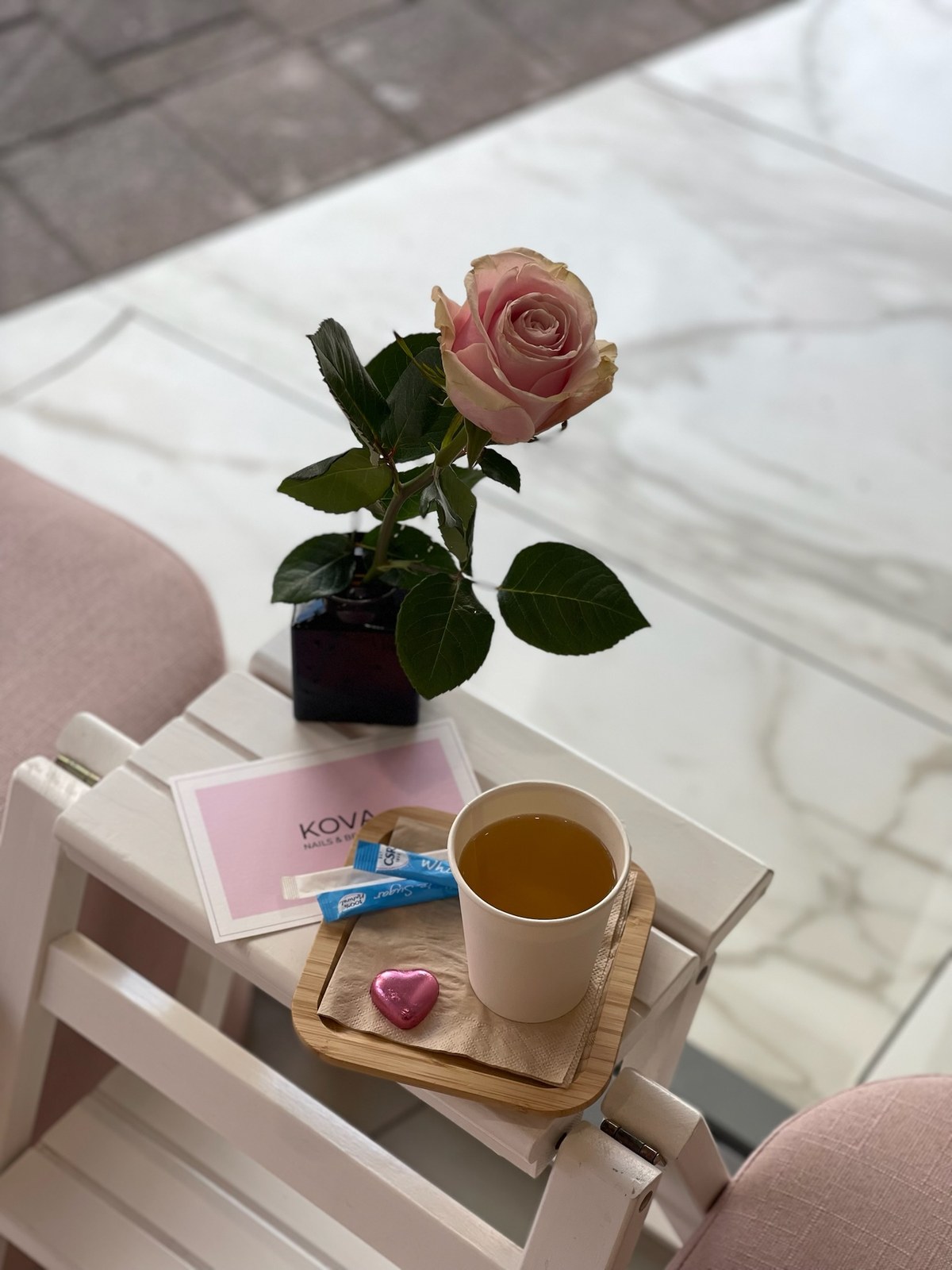 Rose and tea served during a KOVA appointment